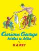 Curious_George_rides_a_bike